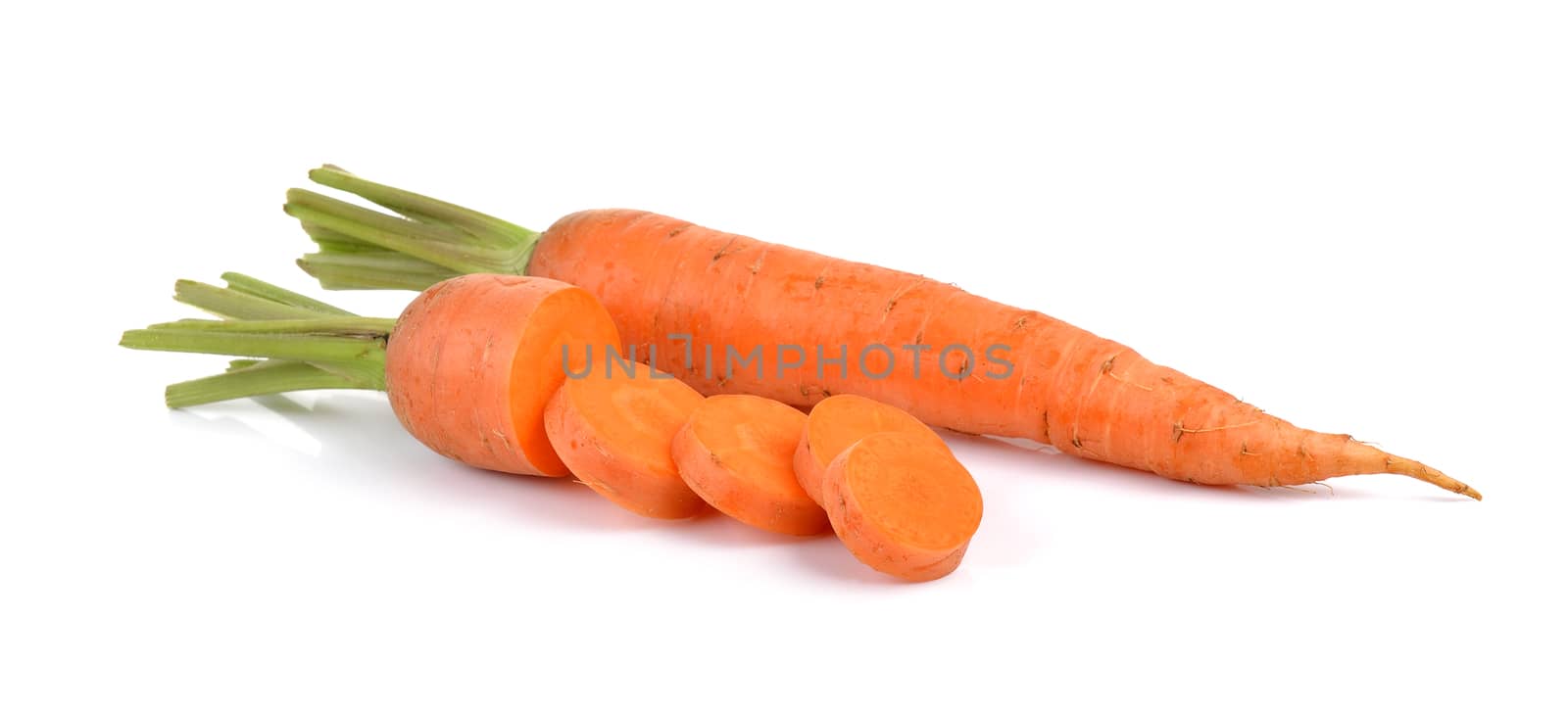  baby carrots isolated on a  white background by sommai