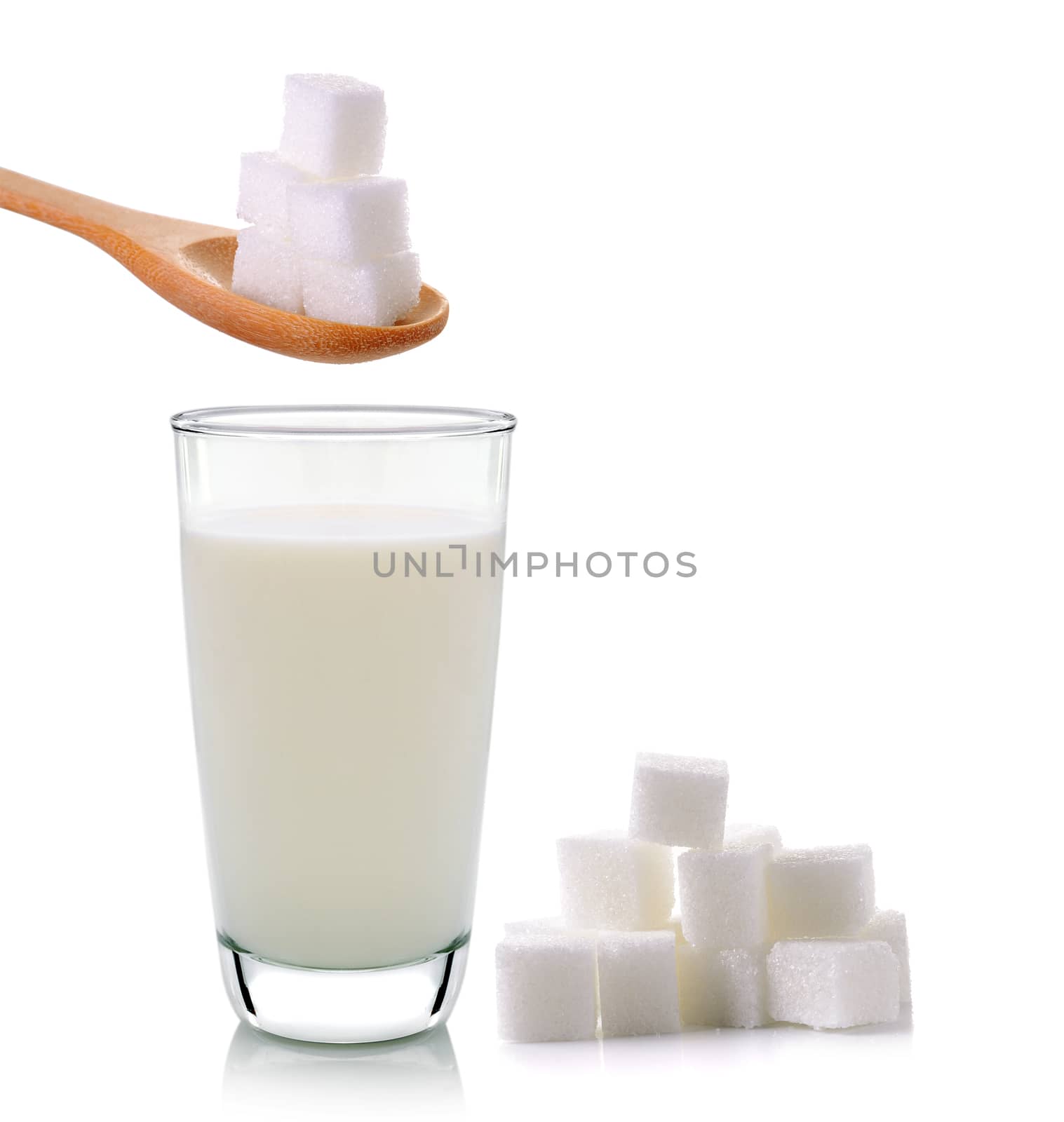 glass of milk  with sugar on a white background by sommai