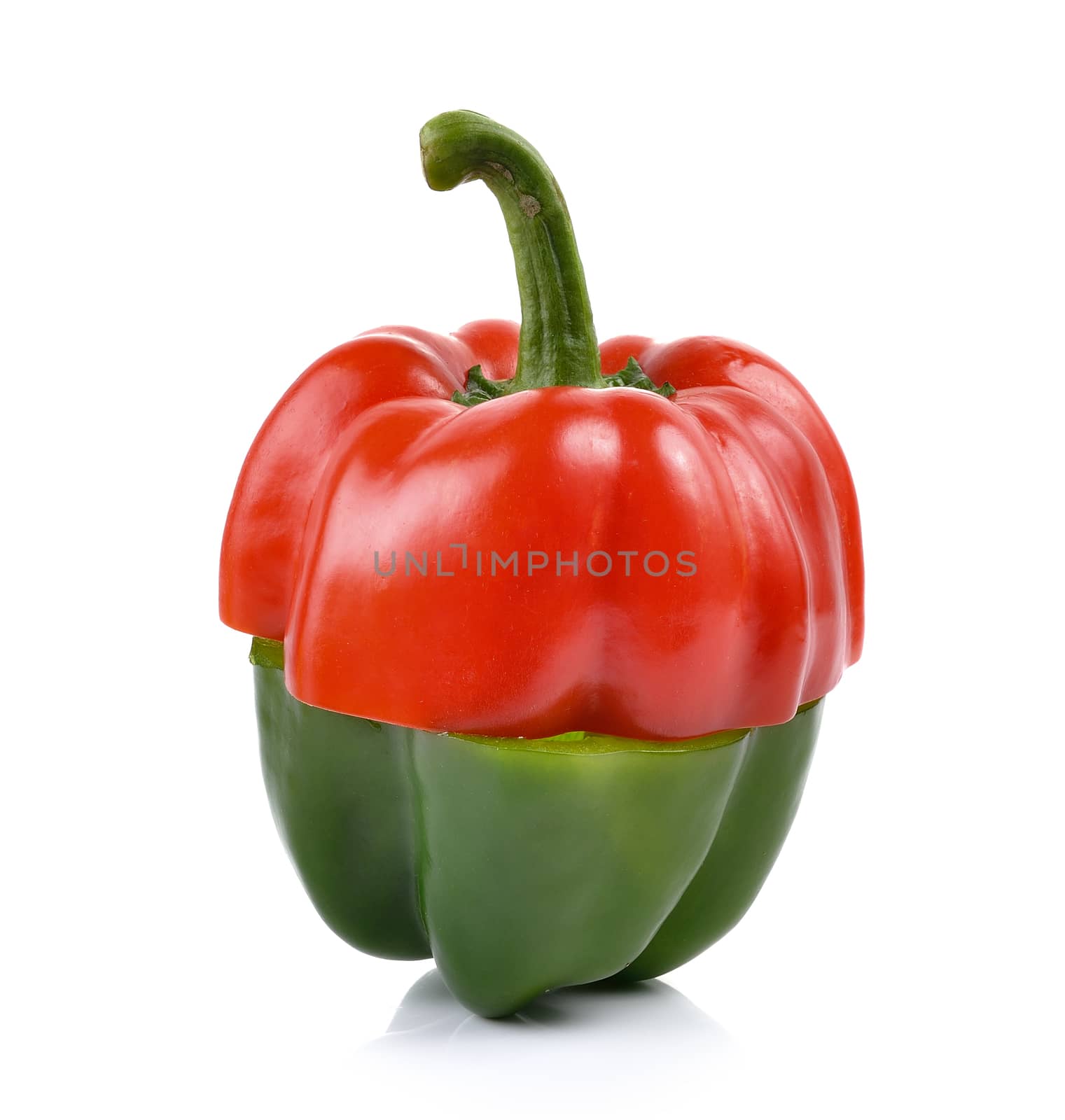 red and green pepper over white background by sommai