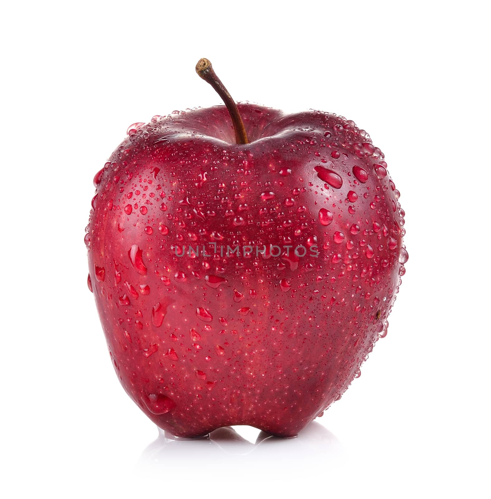 red apple with water drops on white background by sommai