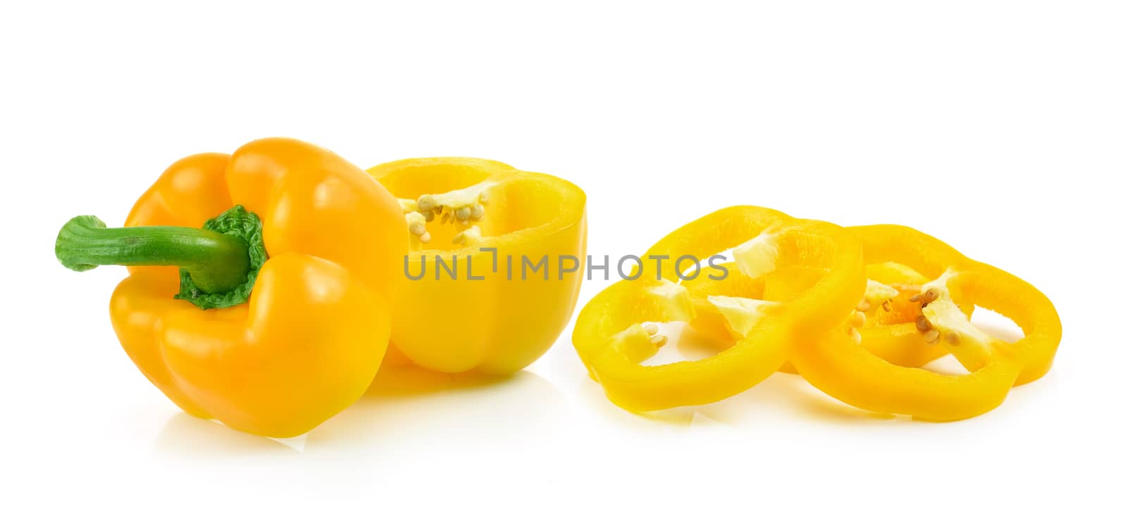 Sliced yellow paprika pepper isolated on white background