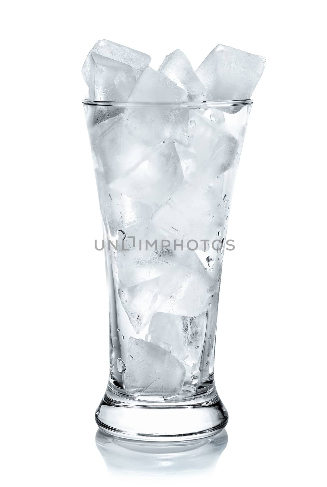 Glass with ice cubes. Isolated on white background by sommai