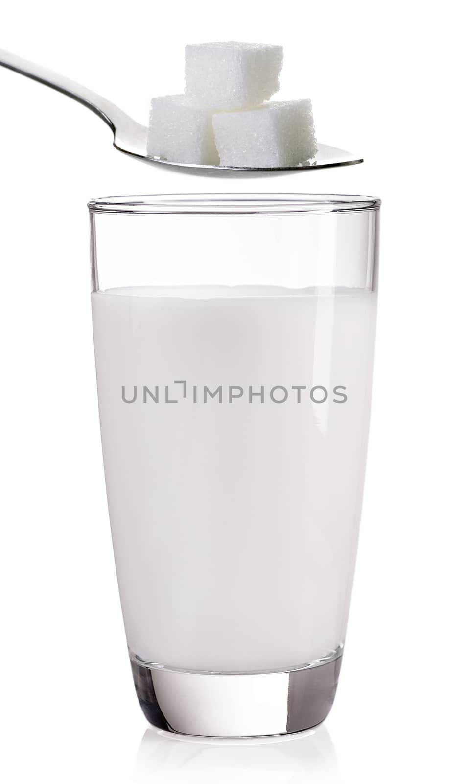 glass of milk  with sugar on a white background