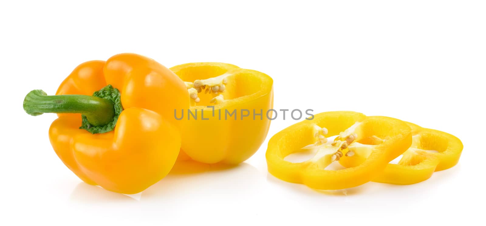 Sliced yellow paprika pepper isolated on white background by sommai