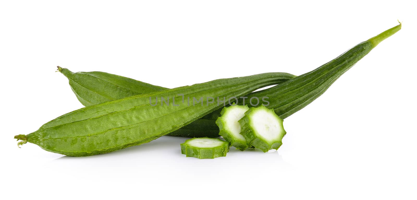 Fresh Angled luffa fruit on white background by sommai