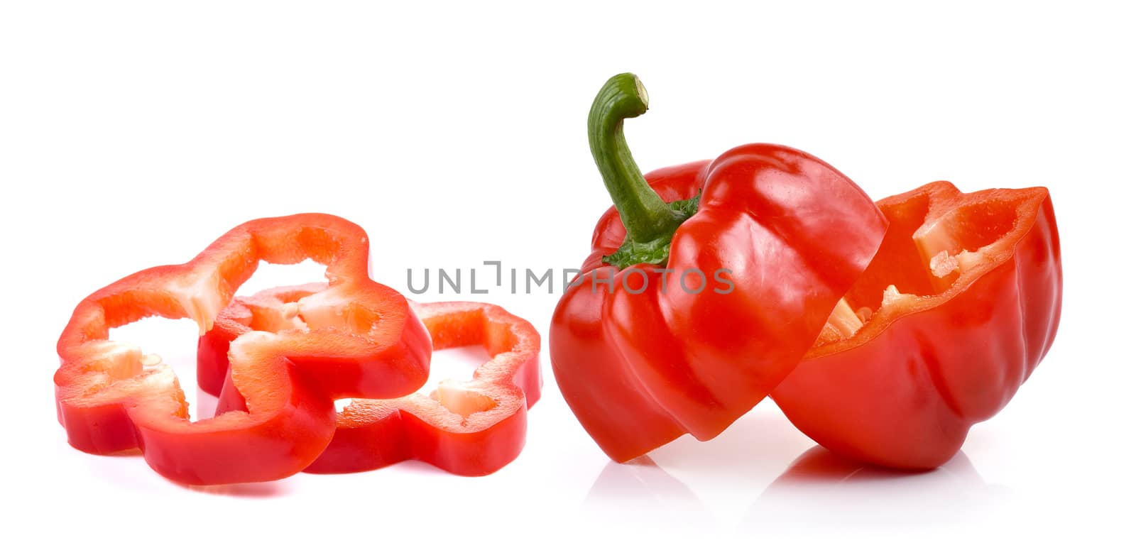 red pepper over white background by sommai