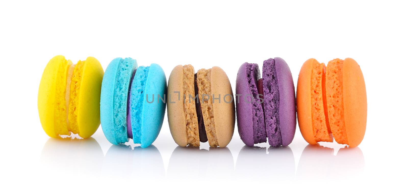 colourful french macaroons or macaron on white background by sommai
