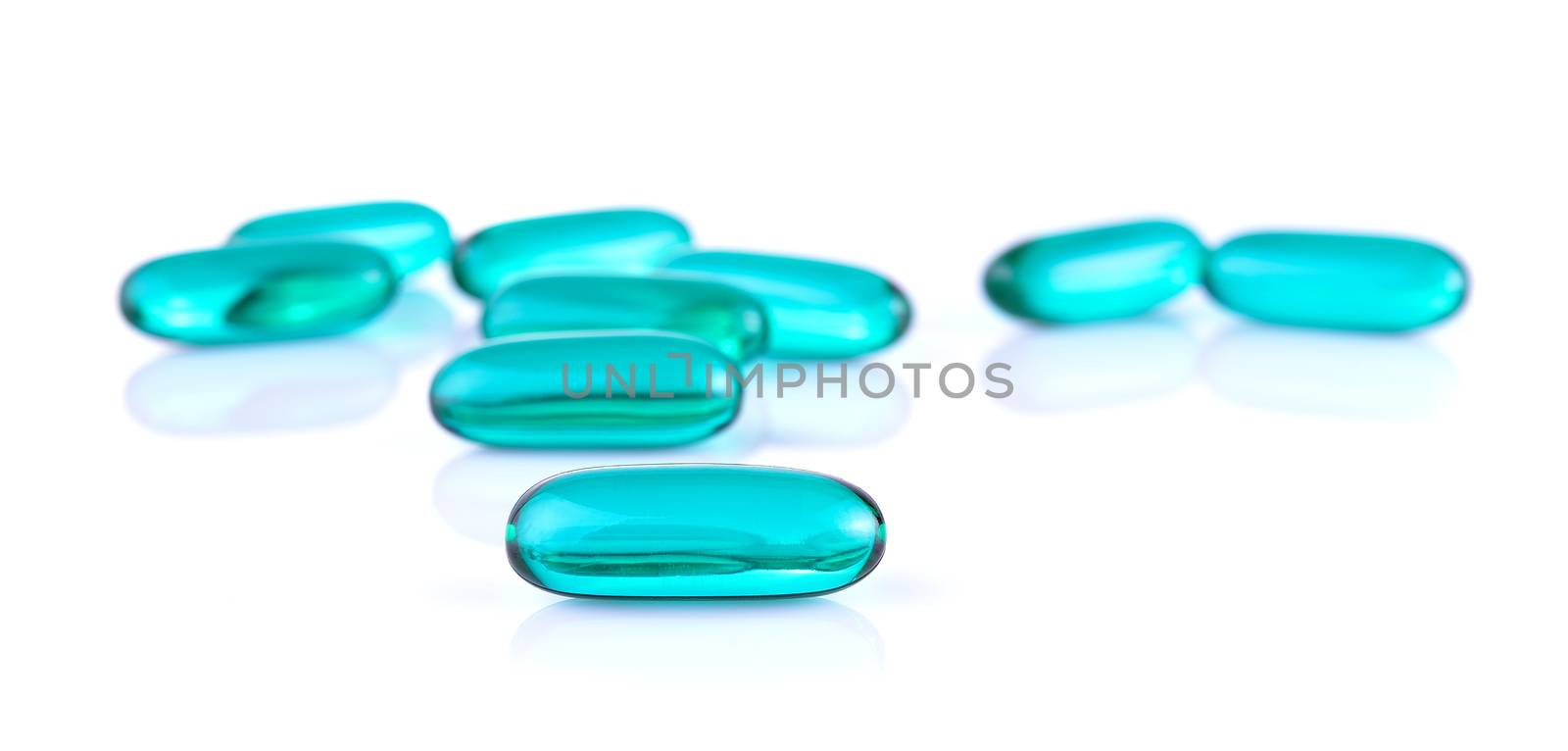 Blue pills capsule on white background by sommai