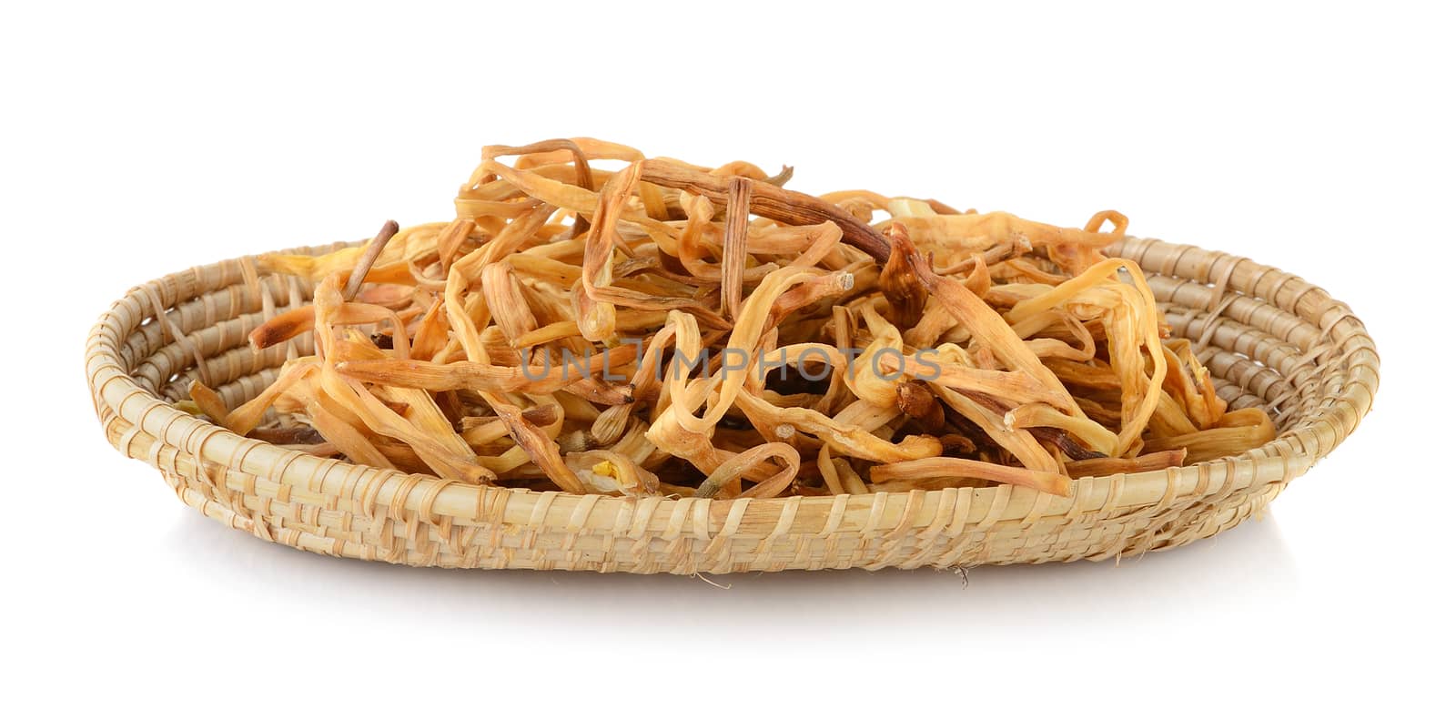 Dried Day Lily in basket on white background