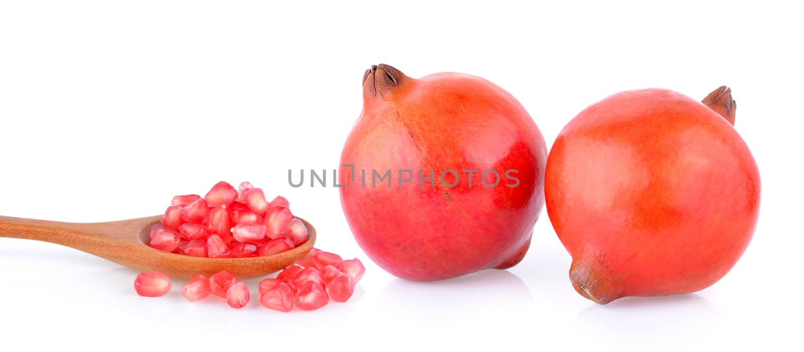 Pomegranate fruit on white background by sommai