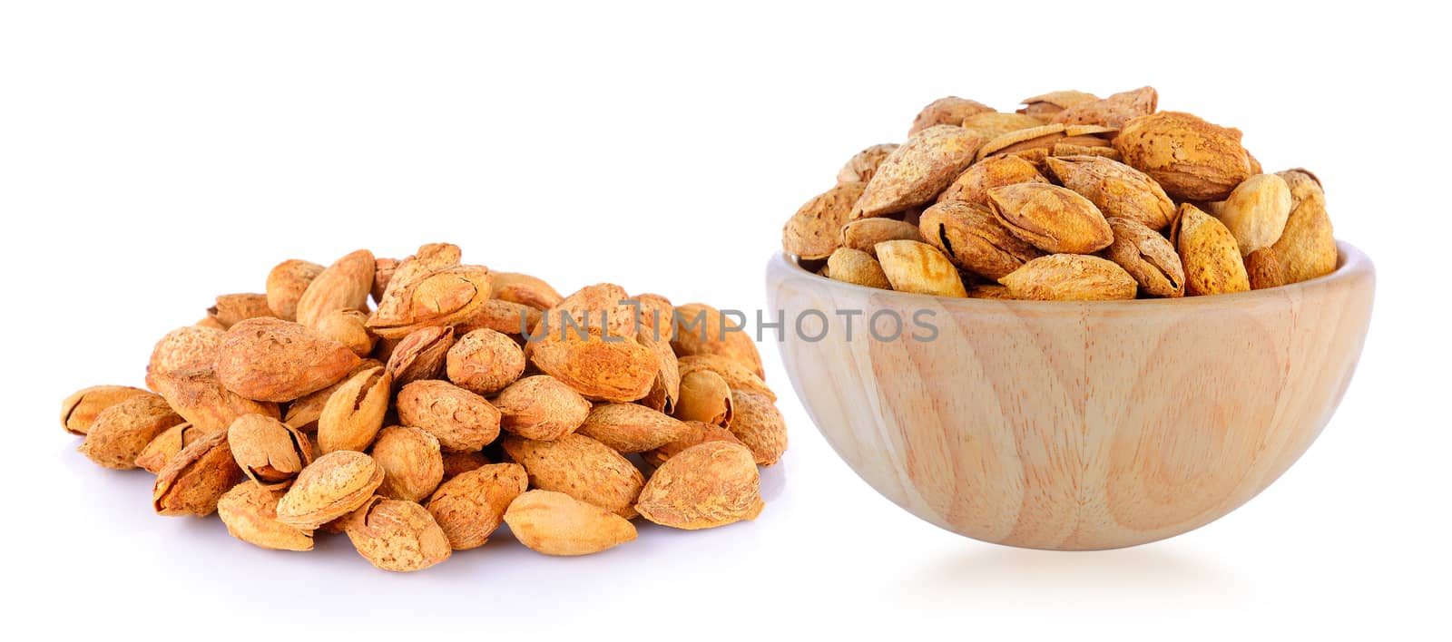 almonds on white background by sommai