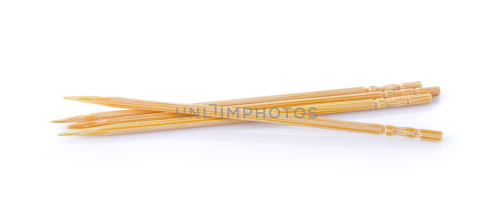 toothpick on white background by sommai
