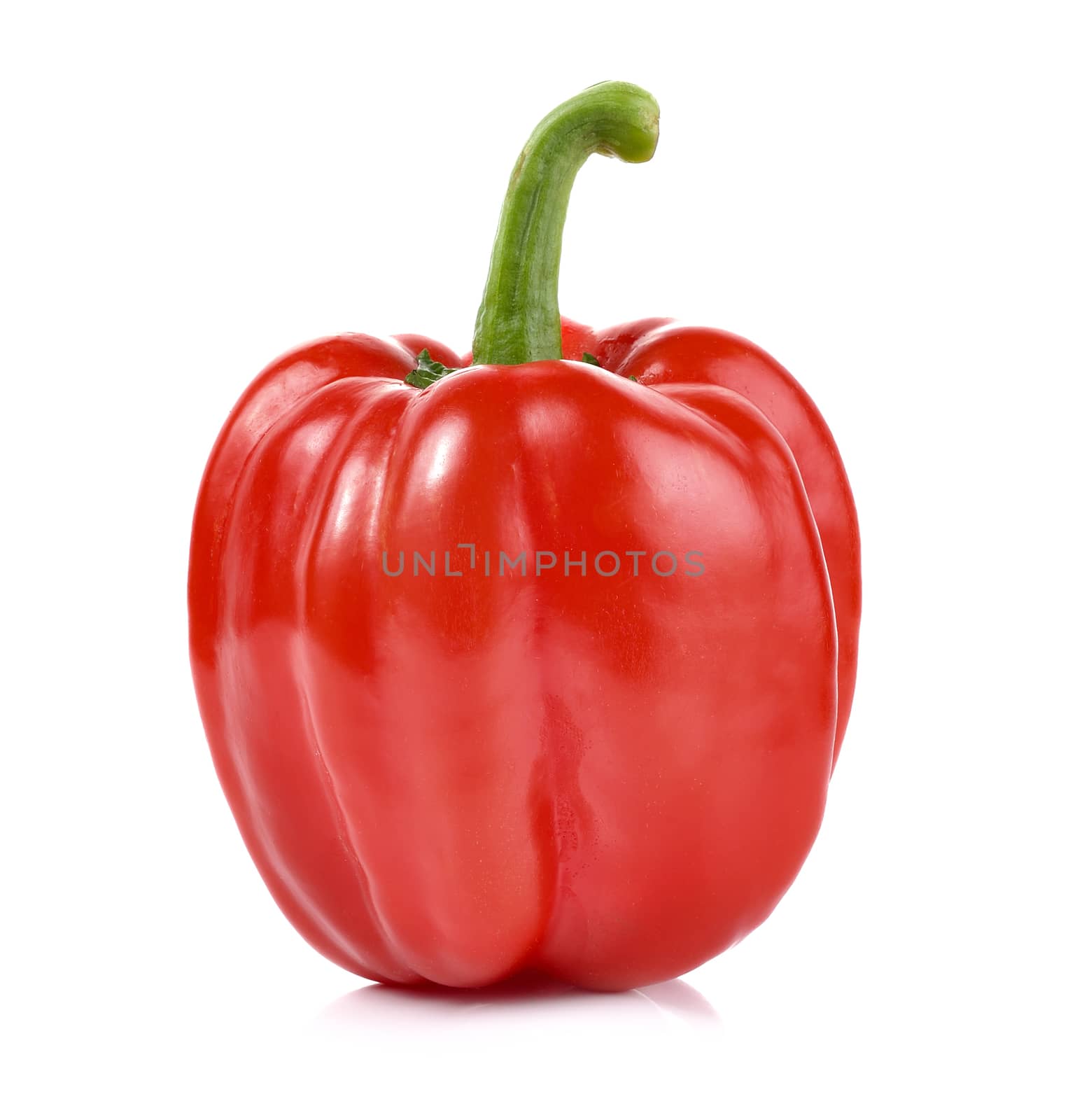 red pepper over white background by sommai