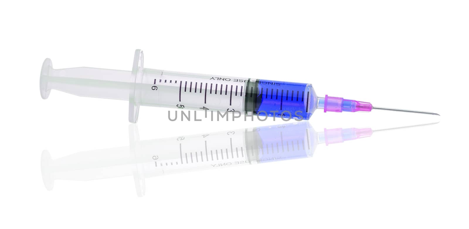  plastic syringe with blue liquid isolated on white background by sommai