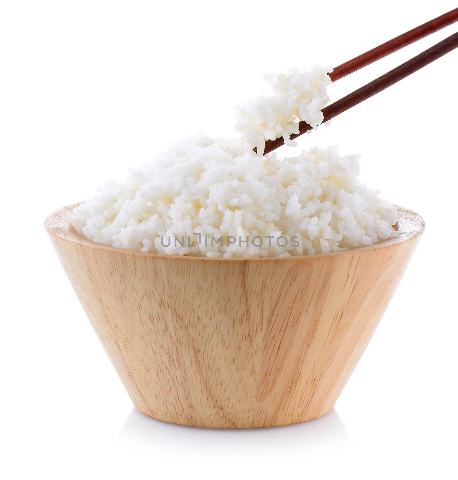 jasmine rice in wood bowl on white background by sommai