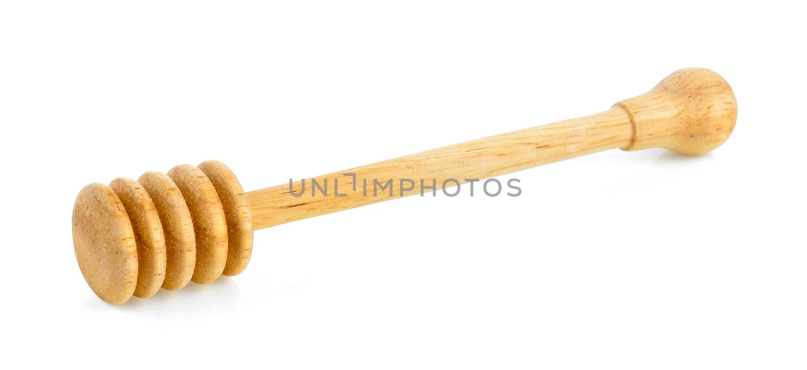 wooden honey stick isolated on white background