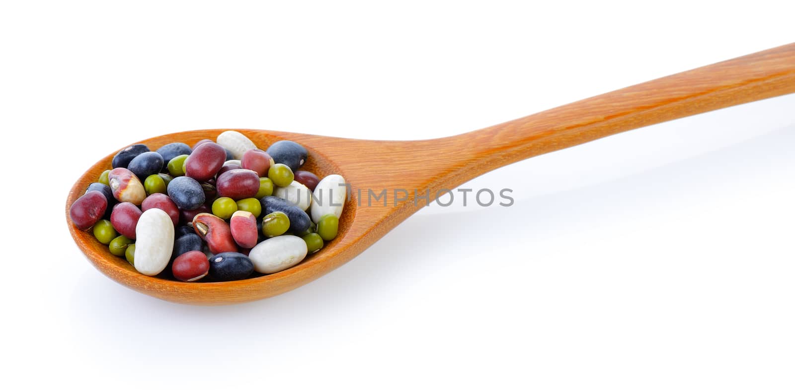 five mix beans in wood spoon on white background by sommai