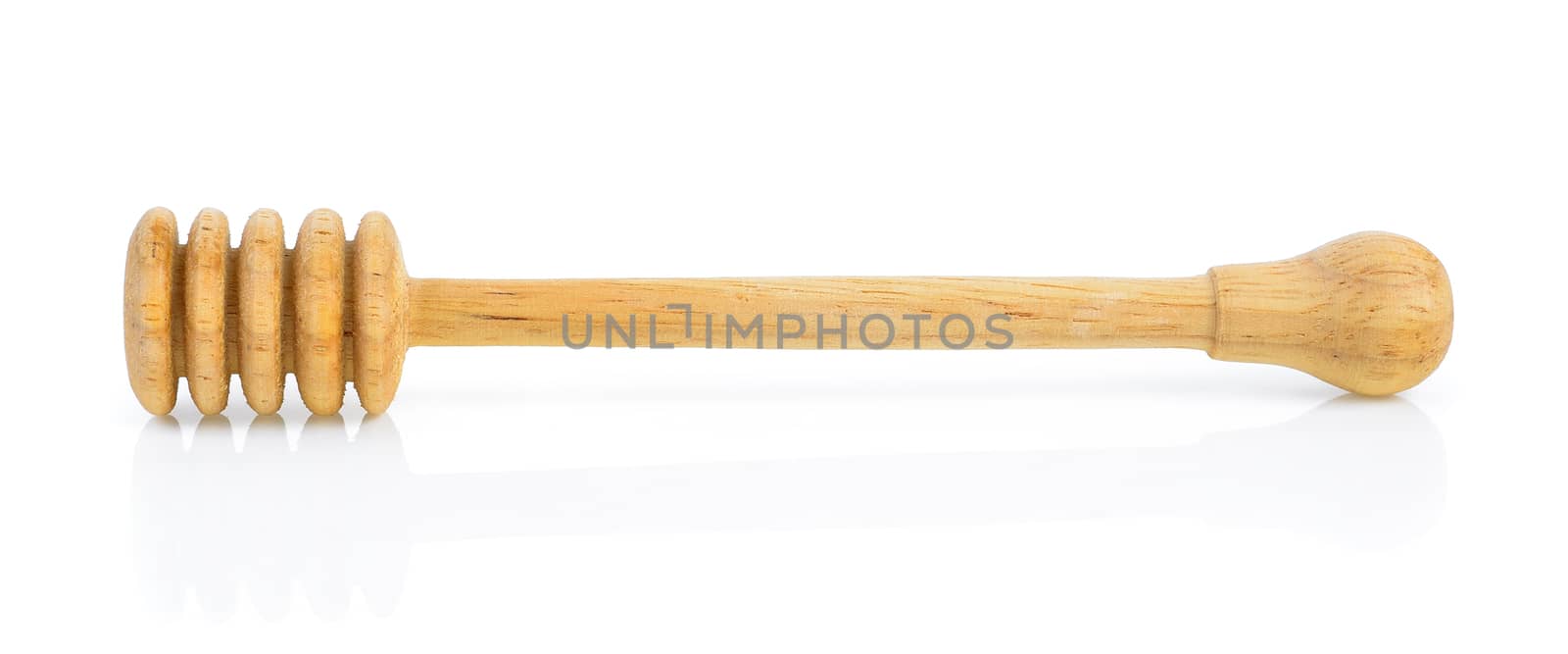 wooden honey stick isolated on white background