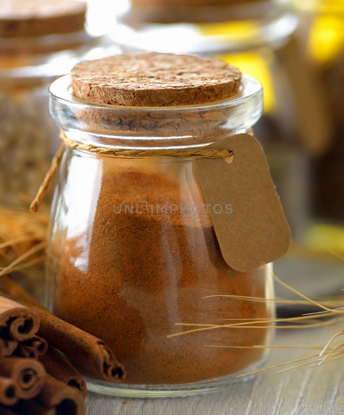 Cinnamon powder in a bottle by sommai