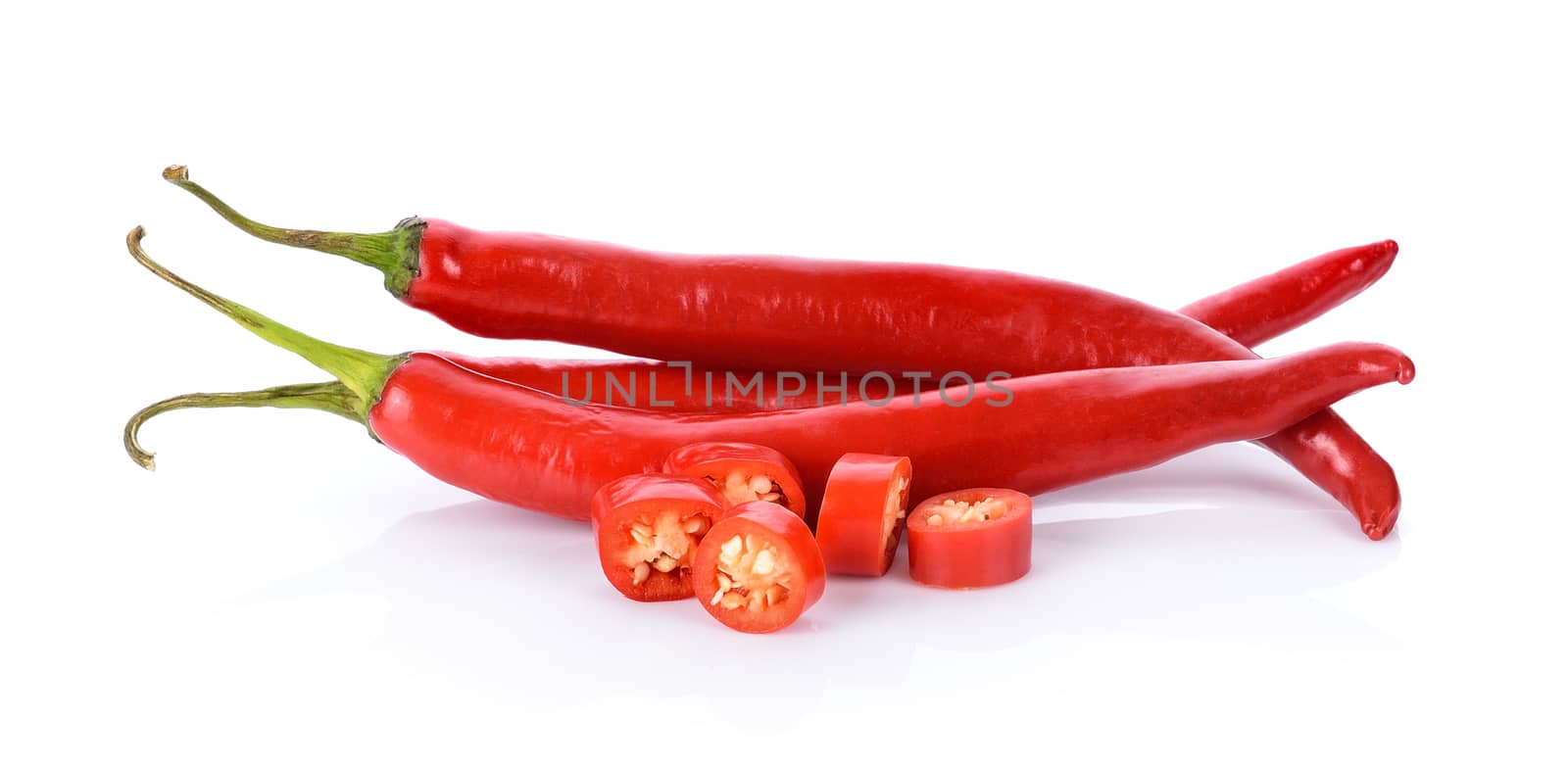 red chili on white background by sommai