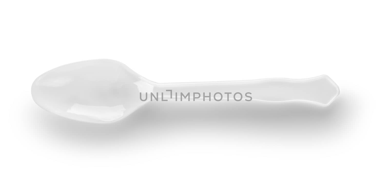 Plastic spoon on white background