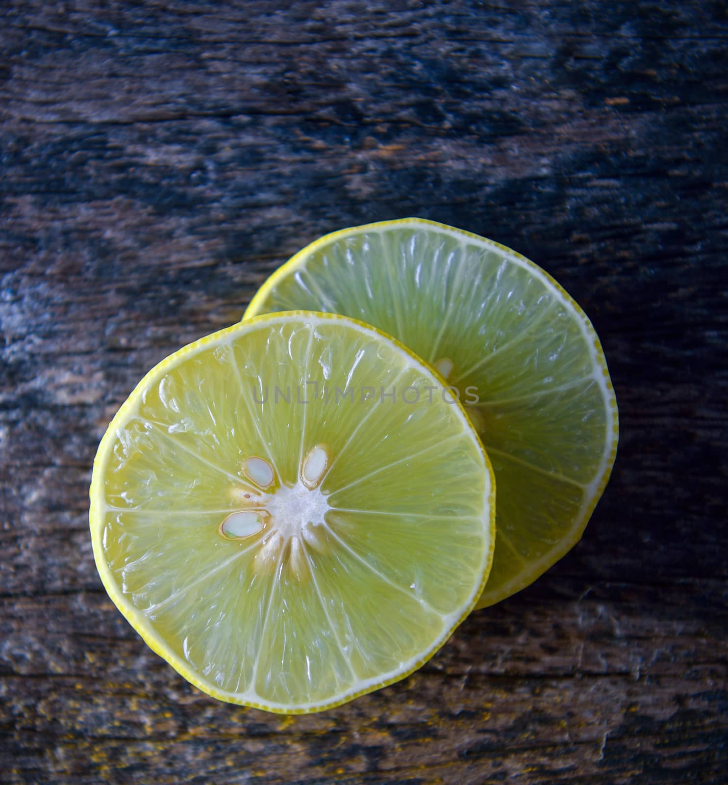 lime slice on wood background