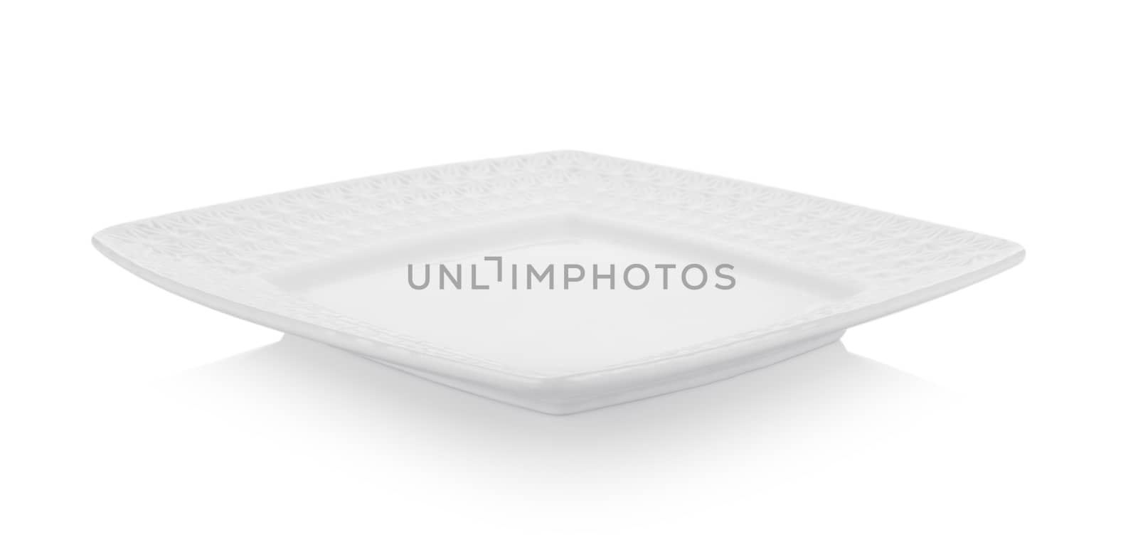 white plate on white background by sommai