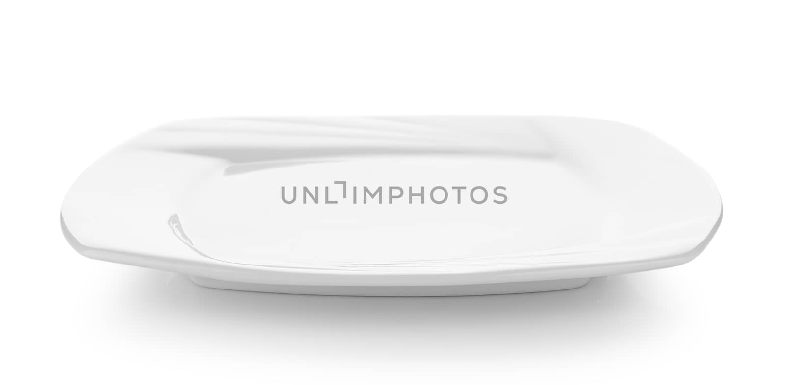 Empty white plate isolated on a white background by sommai