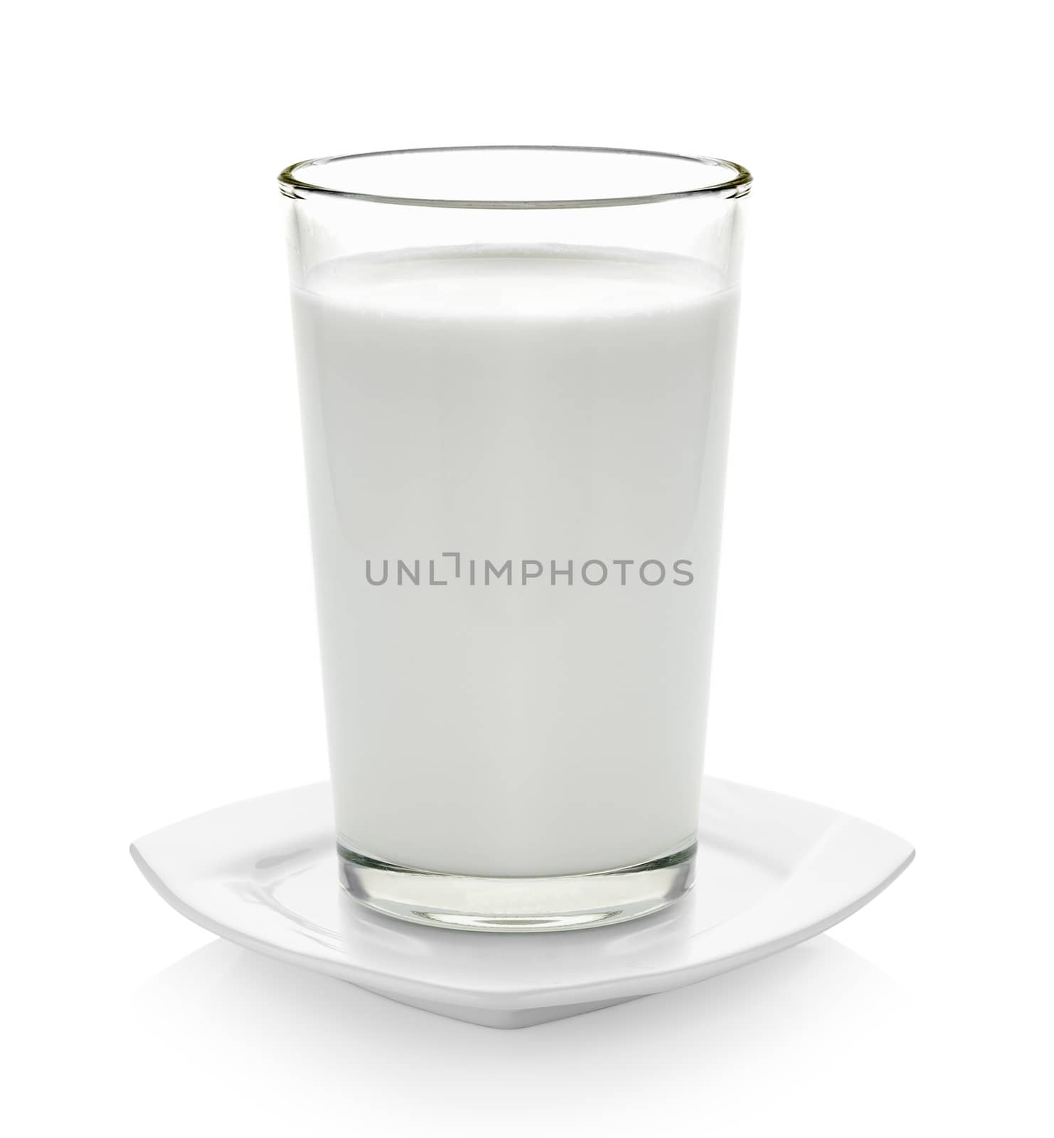 fresh milk in the glass on white background by sommai