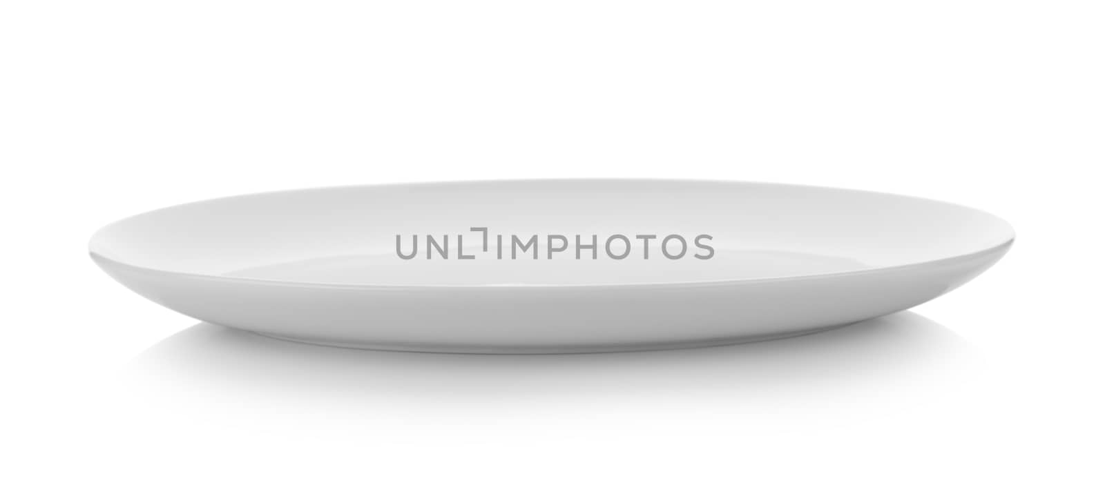 white plate on white background by sommai