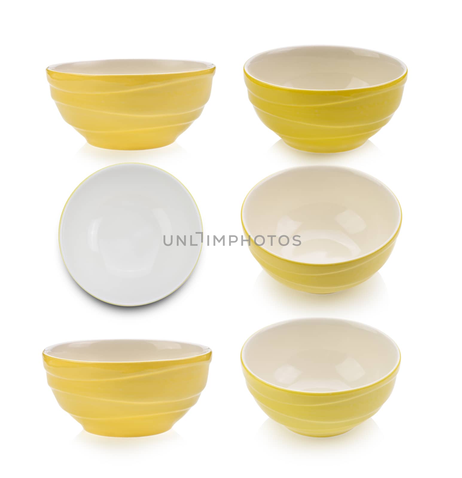 yellow bowl on white background by sommai