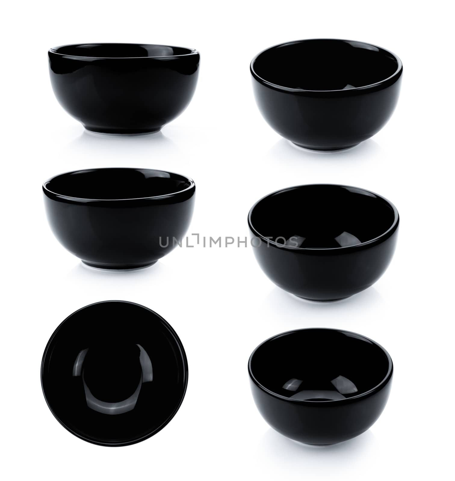 black bowl on white background by sommai
