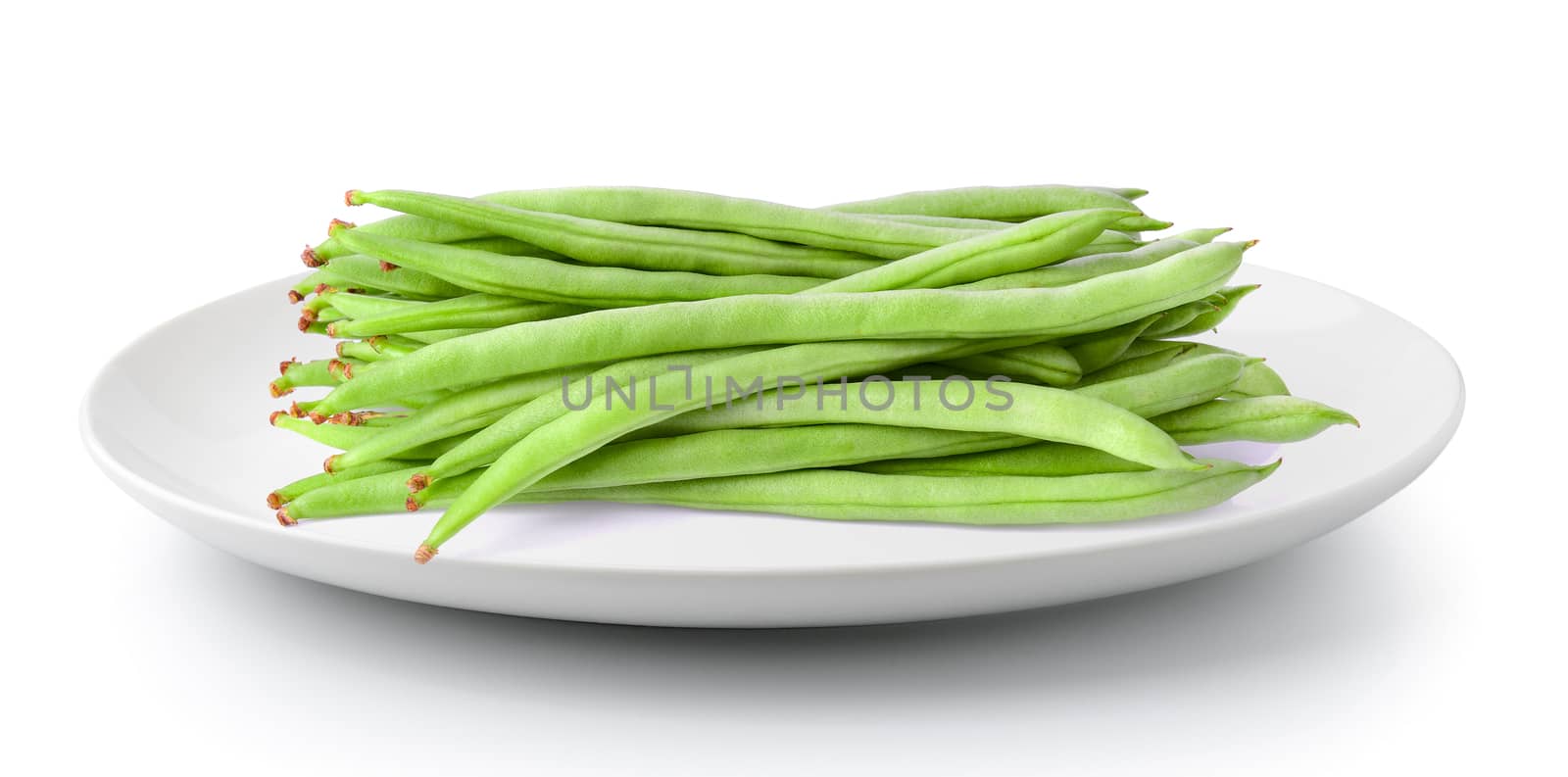 Green beans in a plate isolated on a white background by sommai