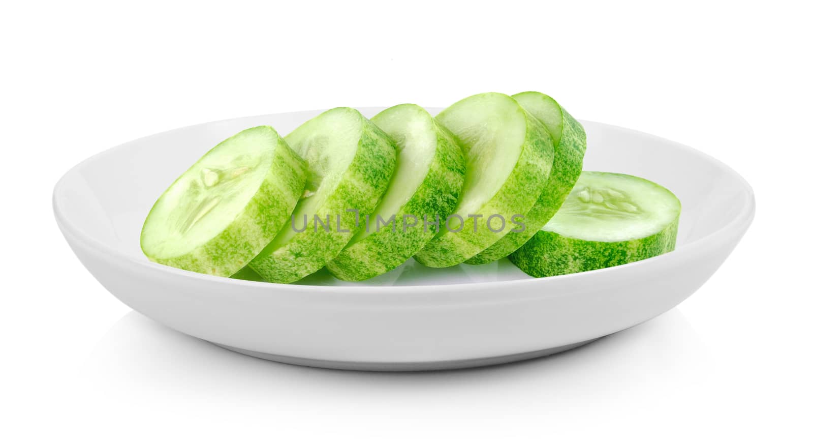 Fresh cucumber slice in plate on white background