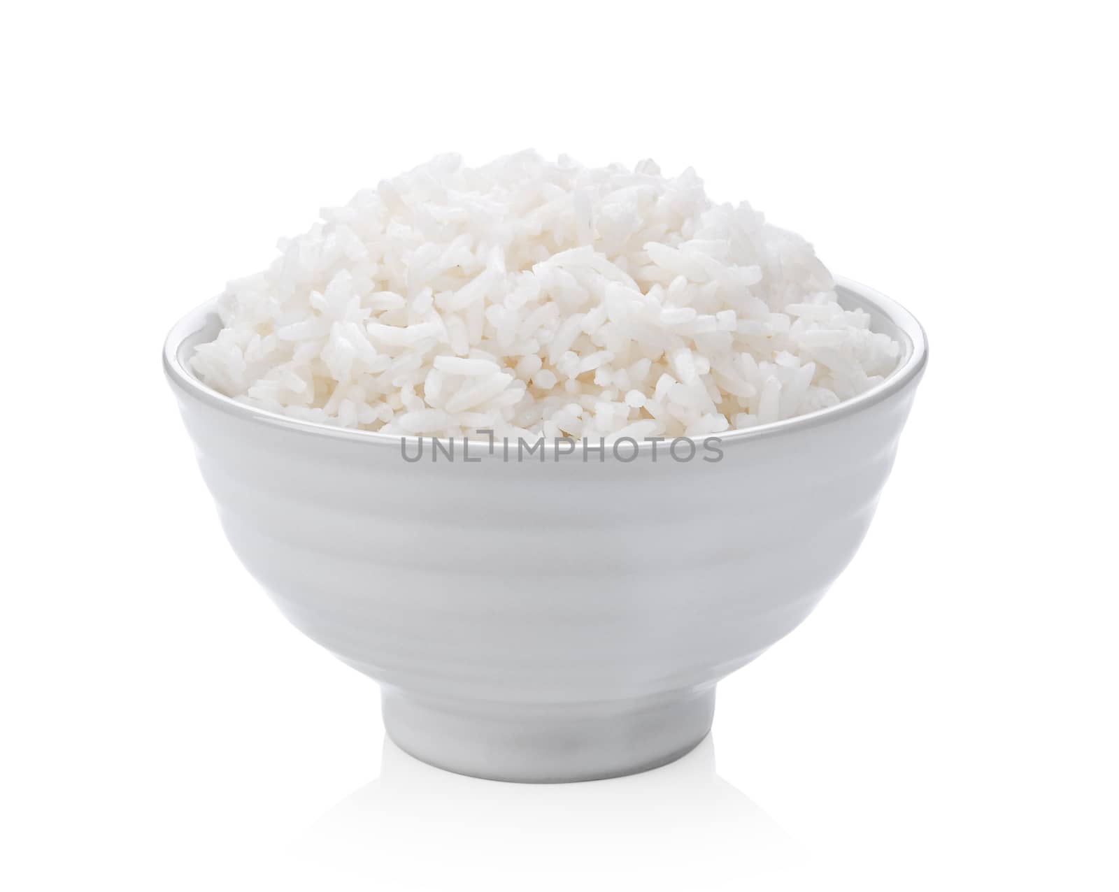 Cooked rice in ceramic bowl on white background