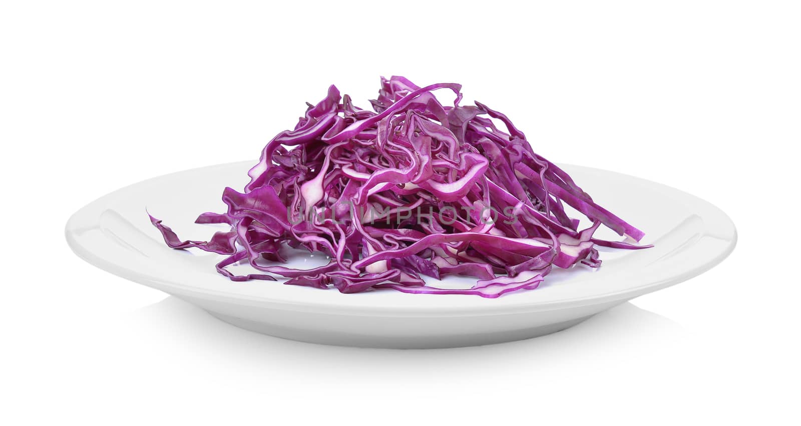 sliced of red cabbage in plate on white background