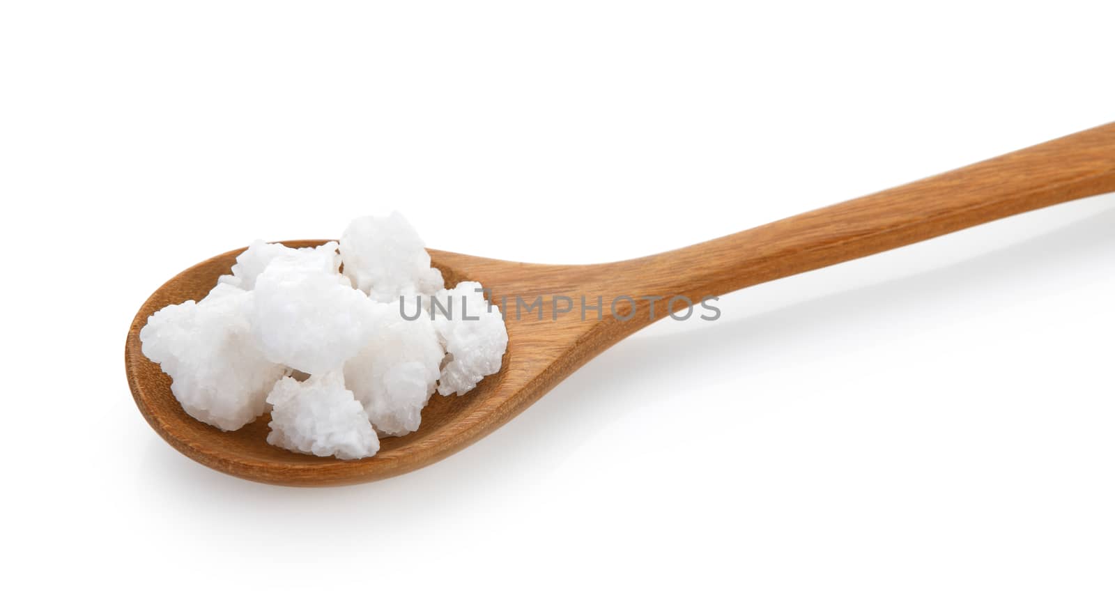 salt in wood spoon on white background