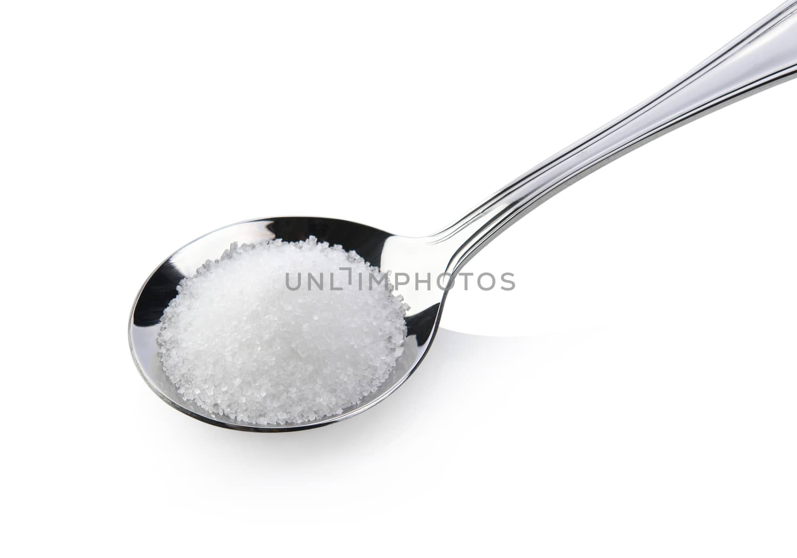 sugar in spoon on white background by sommai