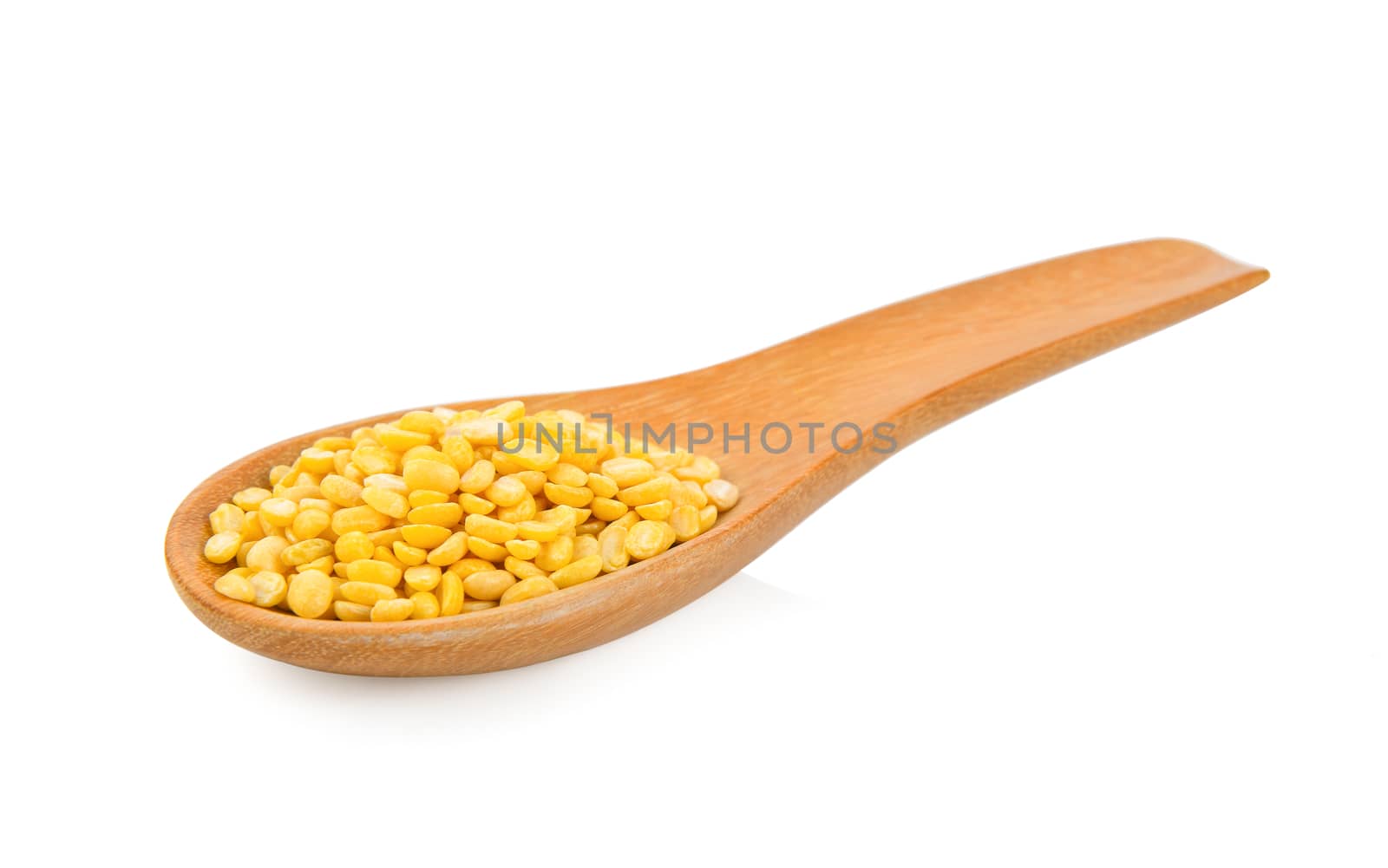 Green beans seeds in wood spoon on white background by sommai