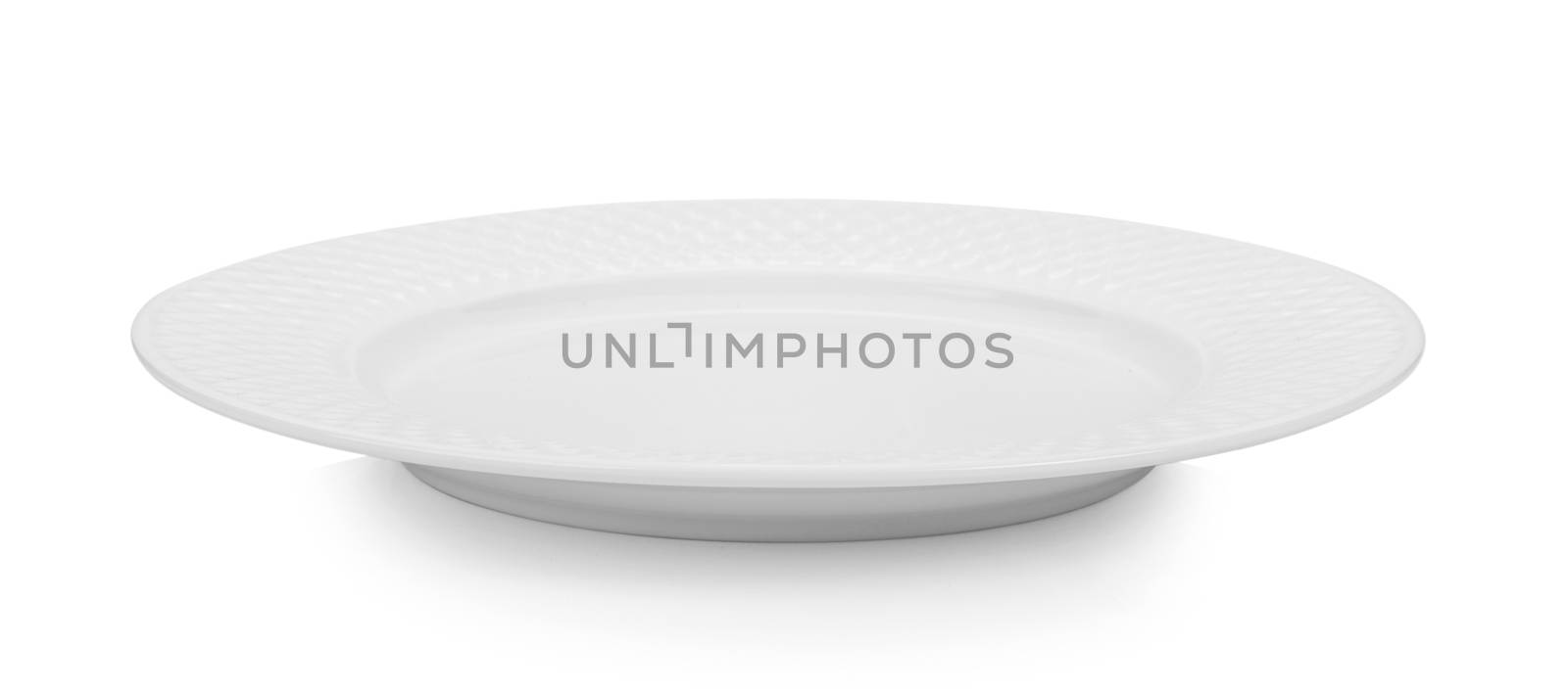 Empty plate on white background by sommai