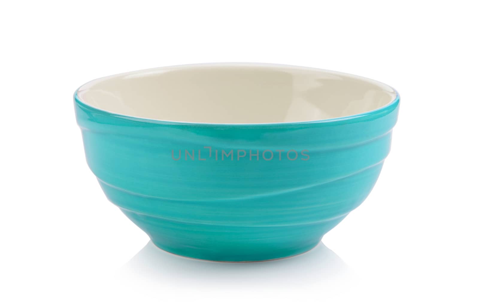 green bowl on white background by sommai