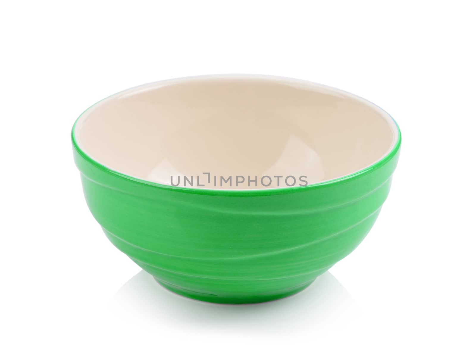 green bowl on white background by sommai