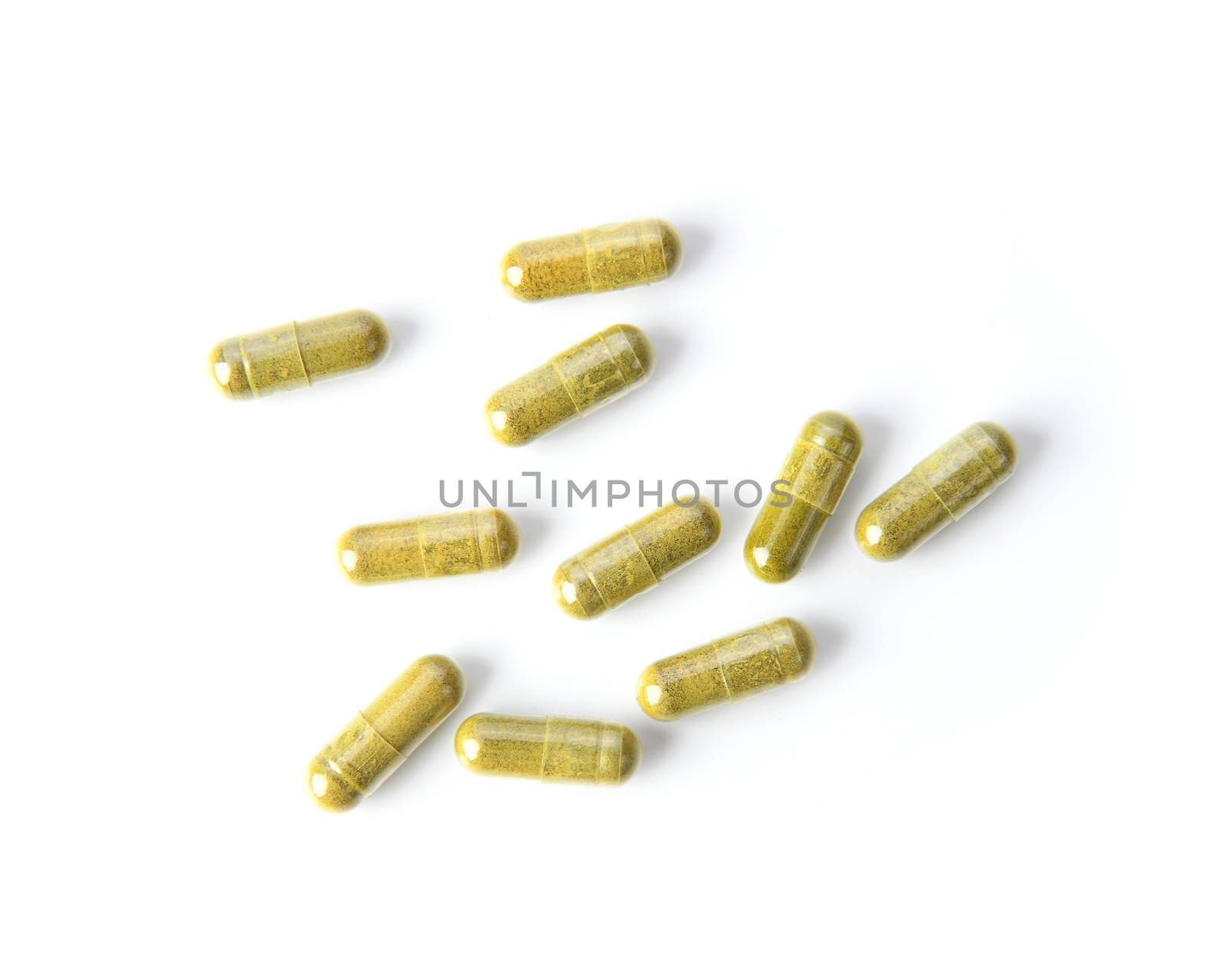 Herbal Capsules on white background by sommai