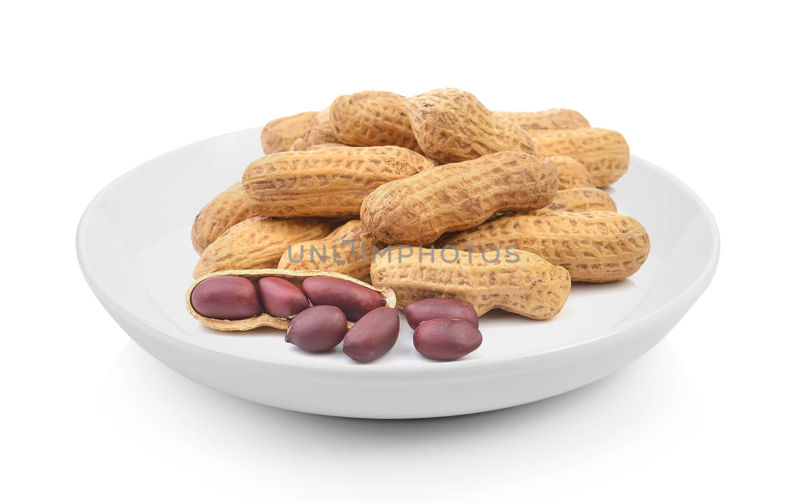peanuts in plate on white background