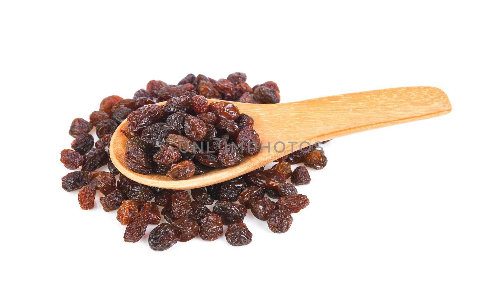 sweet raisin in wood spoon isolated on white background by sommai
