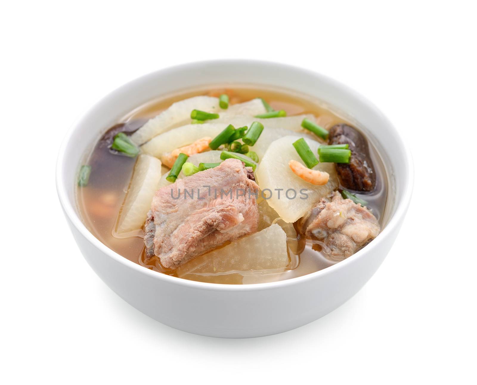 soup radish with pork serve on bowl, thai food isolated on white by sommai