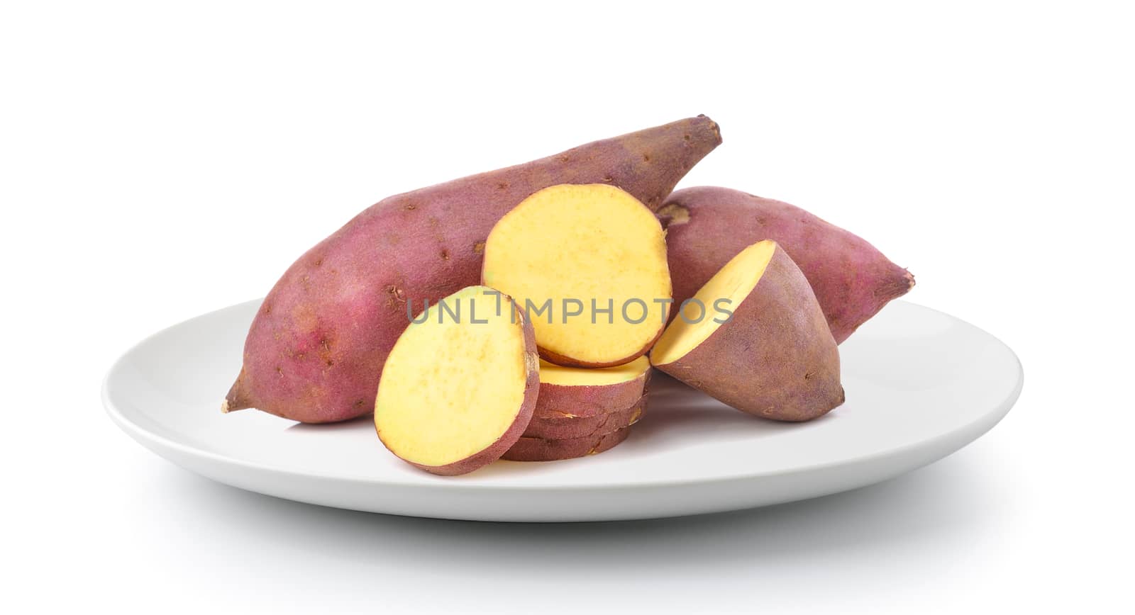 sweet potato in plate isolated on a white background by sommai
