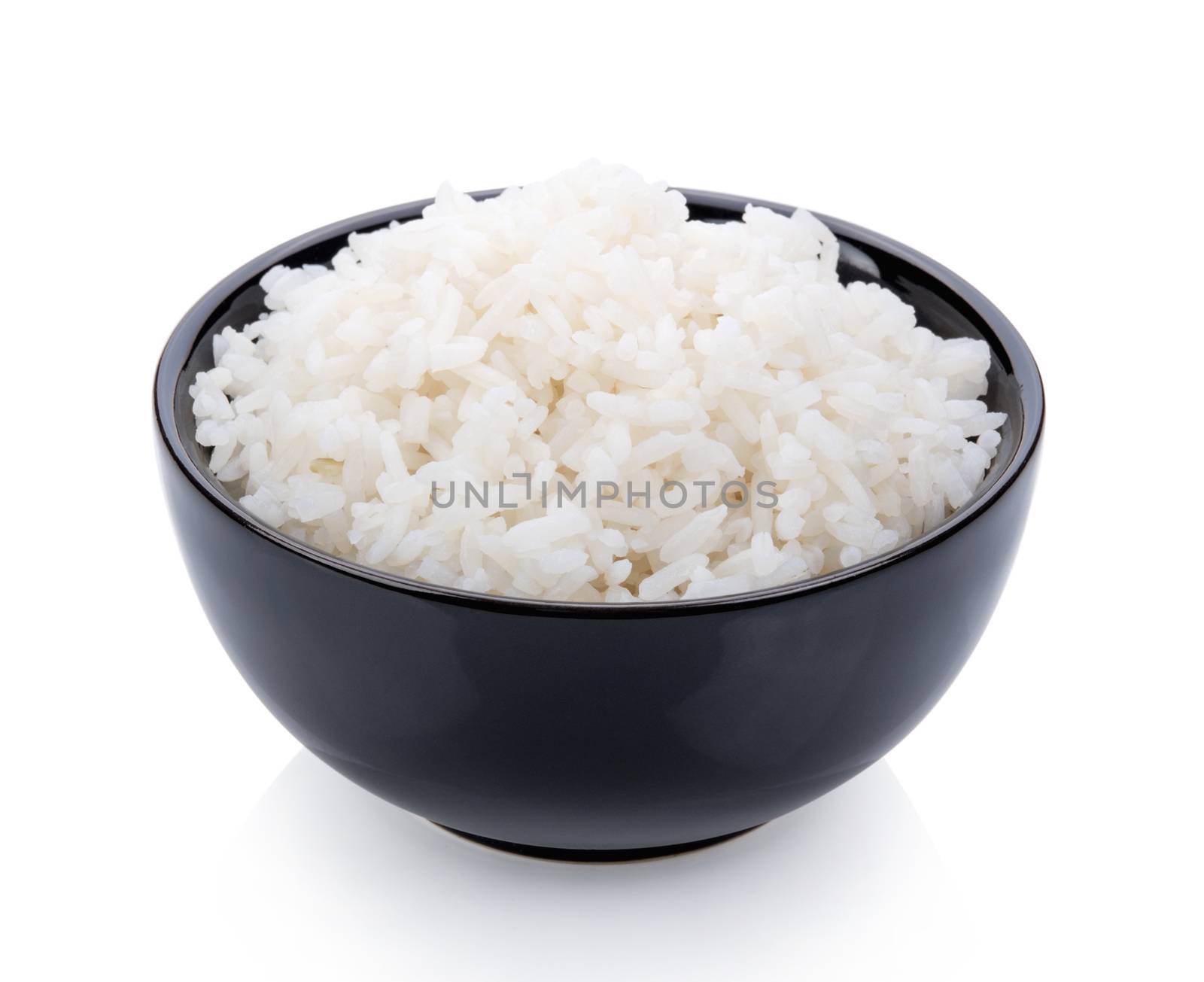 Rice cooker in a black bowl on white background by sommai