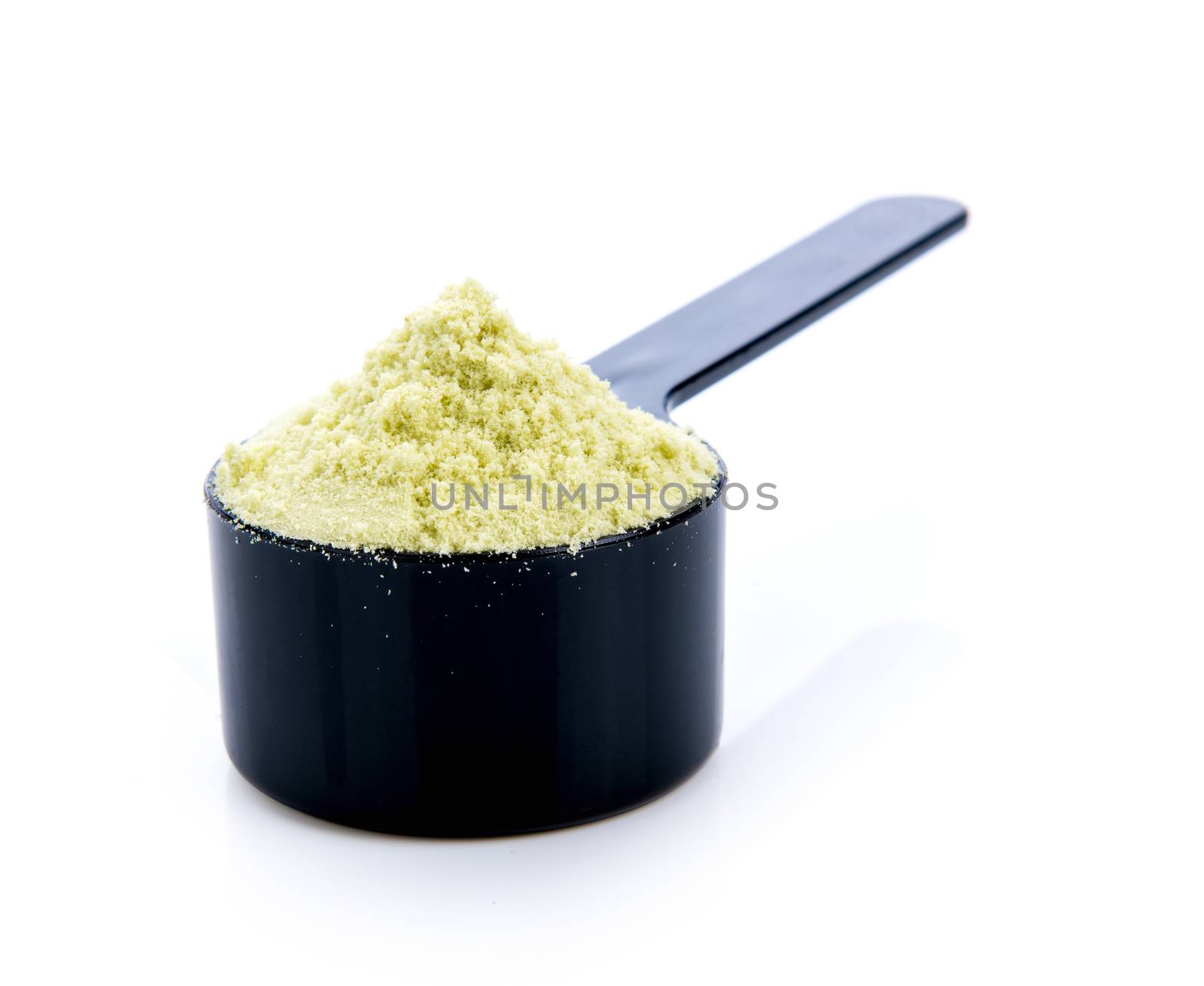 whey protein in scoop on a white background. by sommai