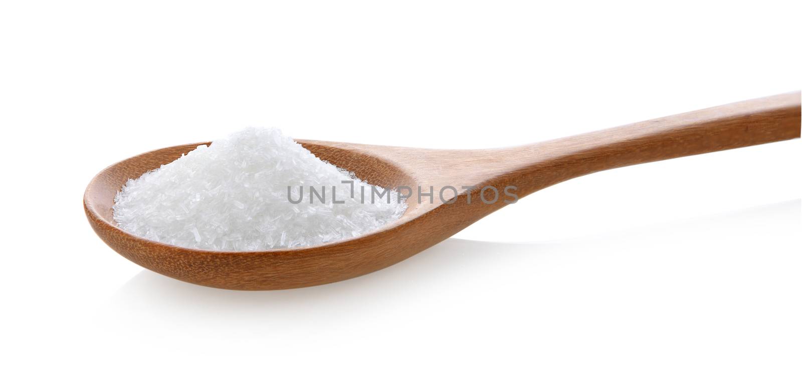 monosodium glutamate in wood spoon on white background by sommai